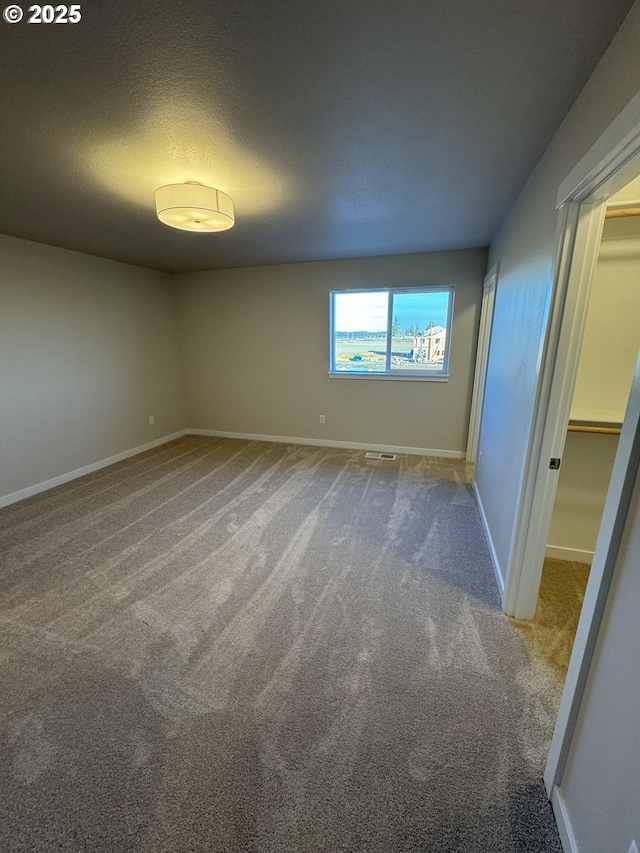 347 SE Shetterly Dr, Dallas, OR 97338 - interior space featuring a textured ceiling and carpet flooring