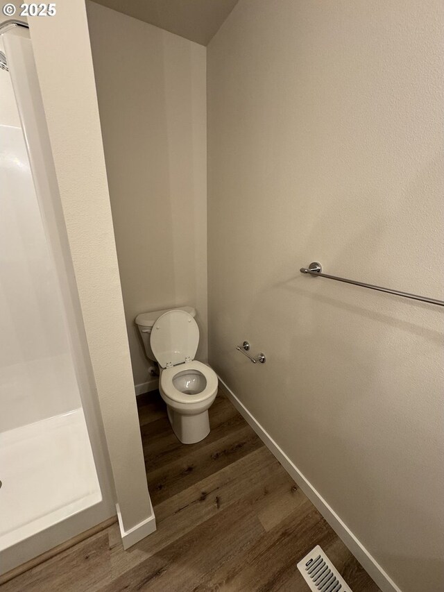 347 SE Shetterly Dr, Dallas, OR 97338 - bathroom with hardwood / wood-style floors and toilet