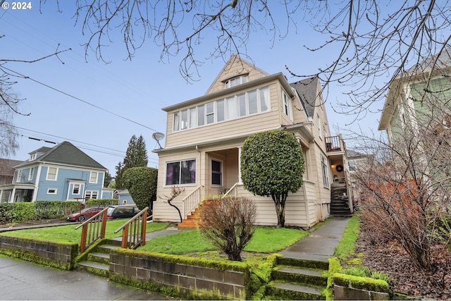 view of front of home with a front yard