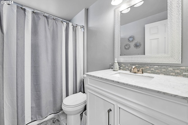 bathroom featuring decorative backsplash, vanity, tile patterned flooring, curtained shower, and toilet