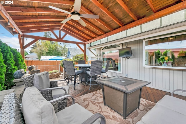 view of patio with ceiling fan, an outdoor hangout area, and a deck