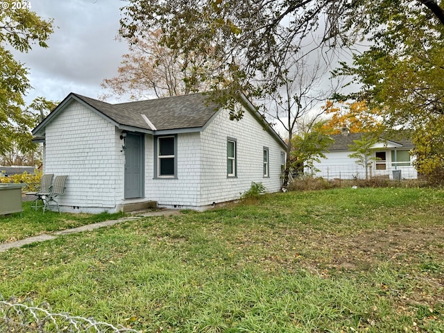 exterior space featuring a front yard