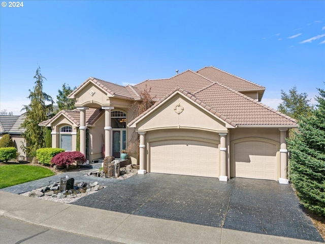 view of front of house with a garage