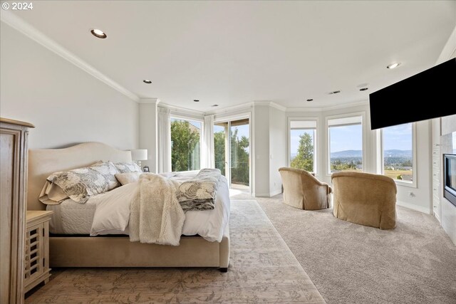 bedroom featuring light carpet, crown molding, and multiple windows