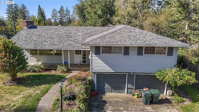 view of front of home with a garage