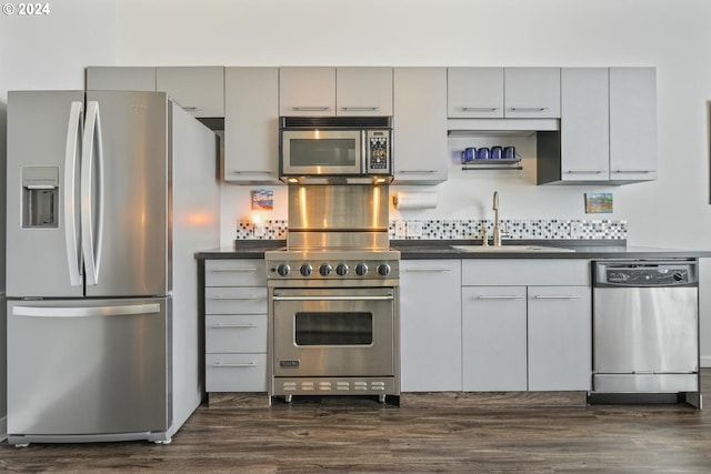 kitchen with gray cabinets, appliances with stainless steel finishes, and sink