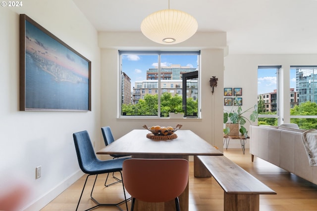 dining area featuring light hardwood / wood-style flooring