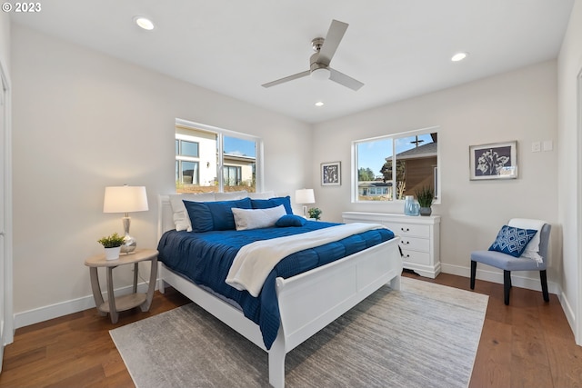 bedroom featuring ceiling fan and wood-type flooring