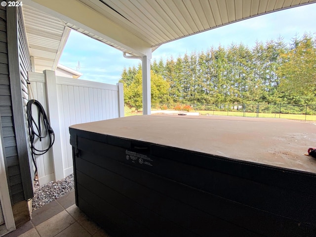 4804 NE 379th St, La Center, WA 98629 - view of patio / terrace featuring a hot tub and fence