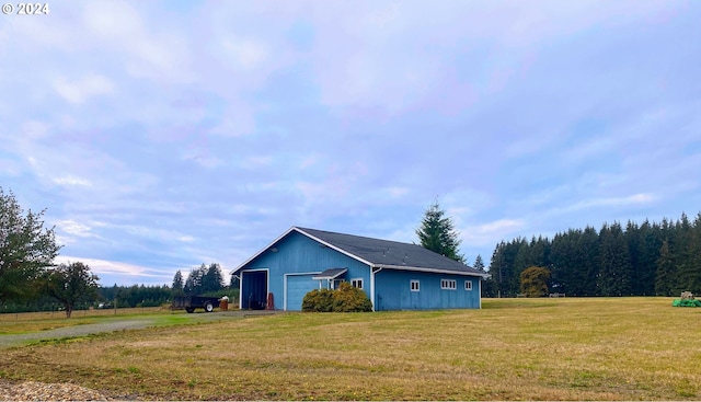 view of property exterior with a yard