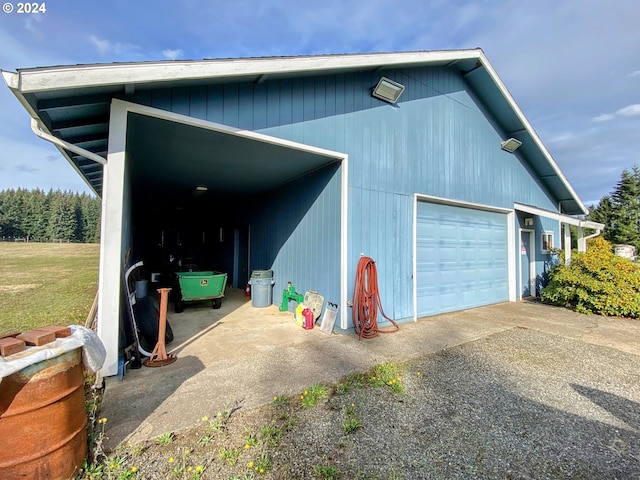 exterior space featuring a garage and a carport