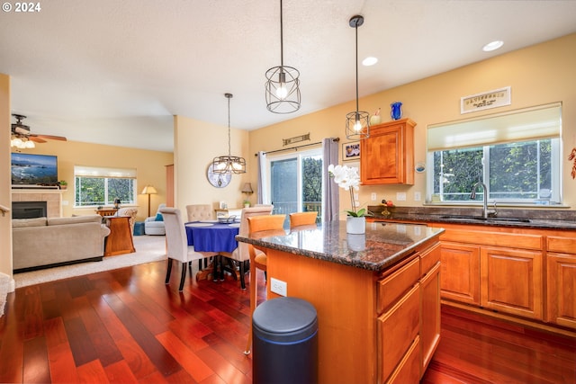 4505 NE Tide Ave, Lincoln City, OR 97367 - kitchen featuring dark wood-style flooring, plenty of natural light, a ceiling fan, a sink, and recessed lighting
