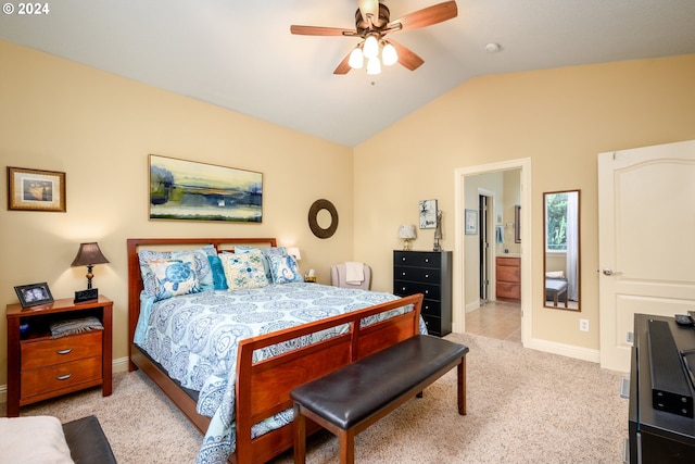 bedroom with vaulted ceiling, light carpet, and ceiling fan