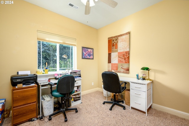 carpeted office with ceiling fan