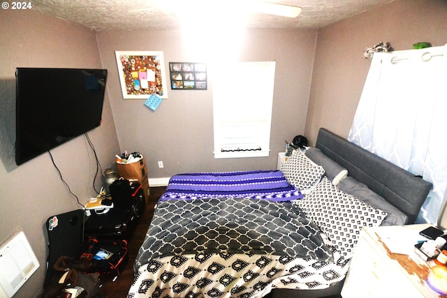 bedroom featuring a textured ceiling