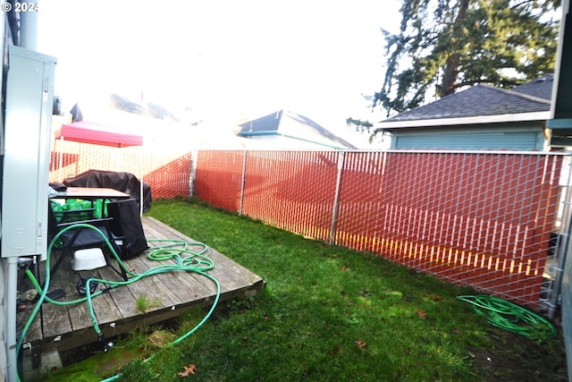 view of yard with a deck