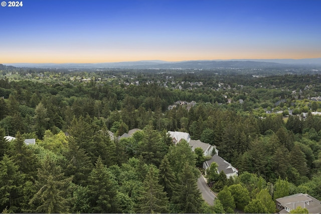 aerial view at dusk with a mountain view