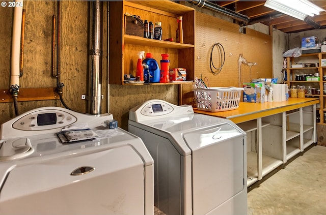 laundry area featuring independent washer and dryer and laundry area