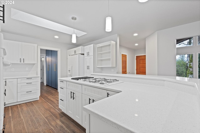 3735 NE Surf Dr, Lincoln City, OR 97367 - kitchen with white appliances, open shelves, dark wood-type flooring, white cabinetry, and recessed lighting