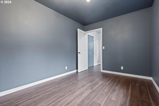 3735 NE Surf Dr, Lincoln City, OR 97367 - unfurnished room featuring dark wood-style floors and baseboards