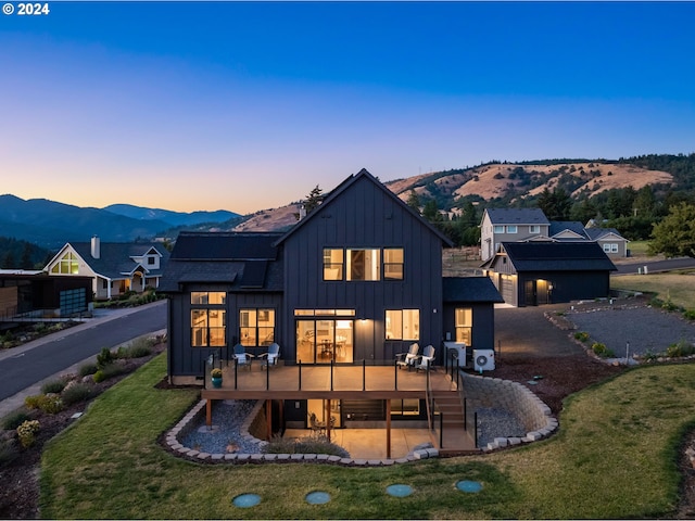 201 Sterling Blvd, White Salmon, WA 98672 - back of property featuring a patio, a mountain view, a yard, and board and batten siding