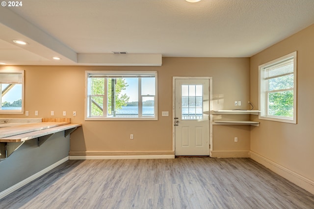 doorway featuring hardwood / wood-style flooring