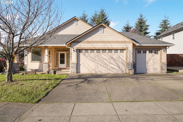 craftsman inspired home featuring a garage