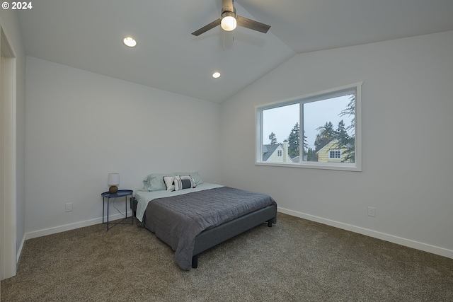 bedroom featuring dark colored carpet, ceiling fan, and lofted ceiling