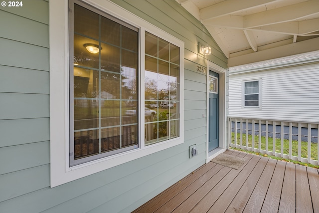 wooden terrace featuring a porch