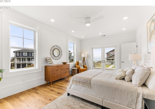 bedroom with access to outside, ceiling fan, and light wood-type flooring