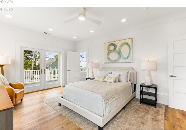 bedroom with french doors, light hardwood / wood-style flooring, access to exterior, ornamental molding, and ceiling fan