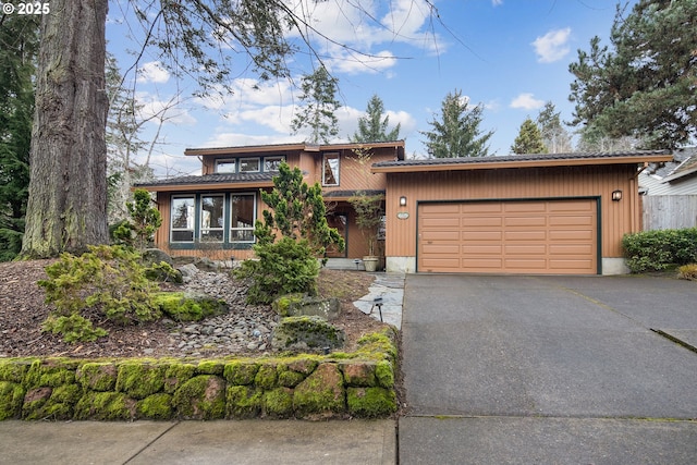 view of front of property with a garage