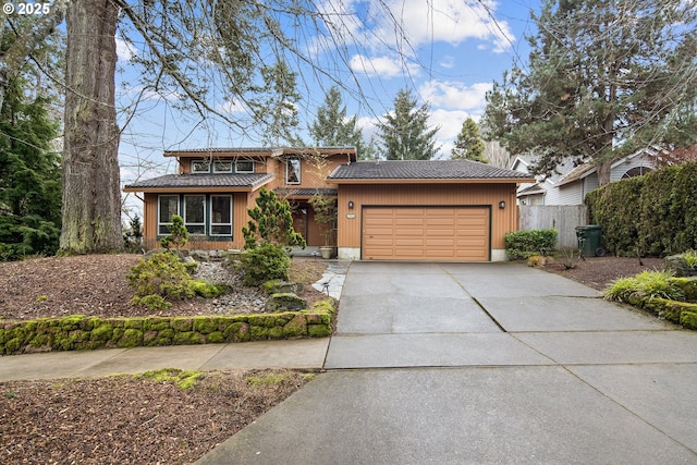 view of front of property with a garage