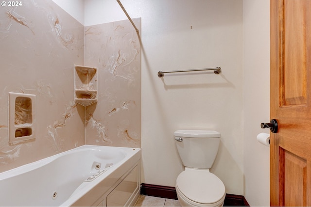 bathroom featuring tile patterned flooring and toilet