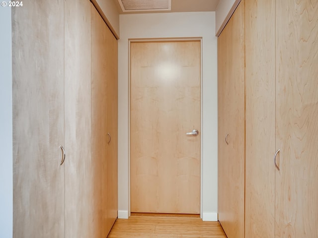 hall featuring light hardwood / wood-style floors