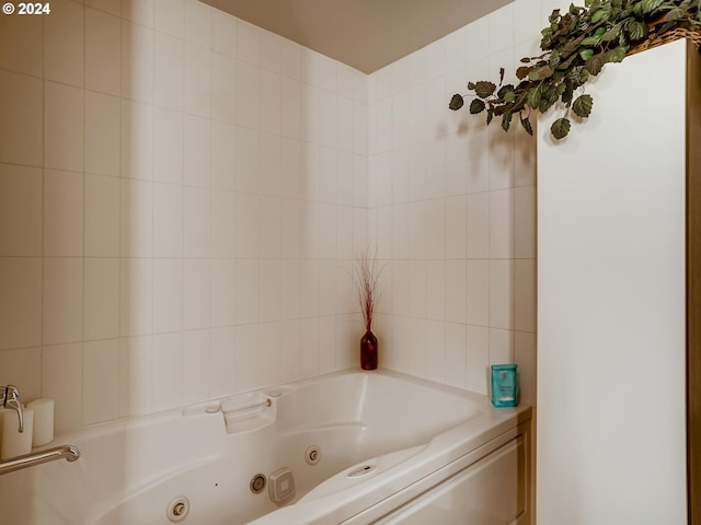 bathroom with a tub to relax in