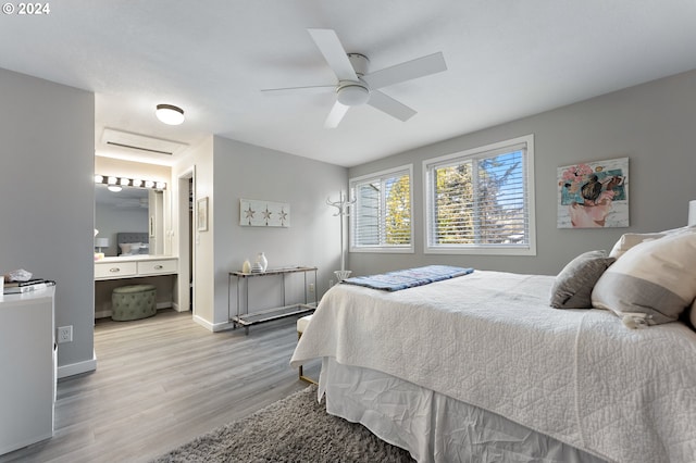 bedroom with hardwood / wood-style flooring and ceiling fan