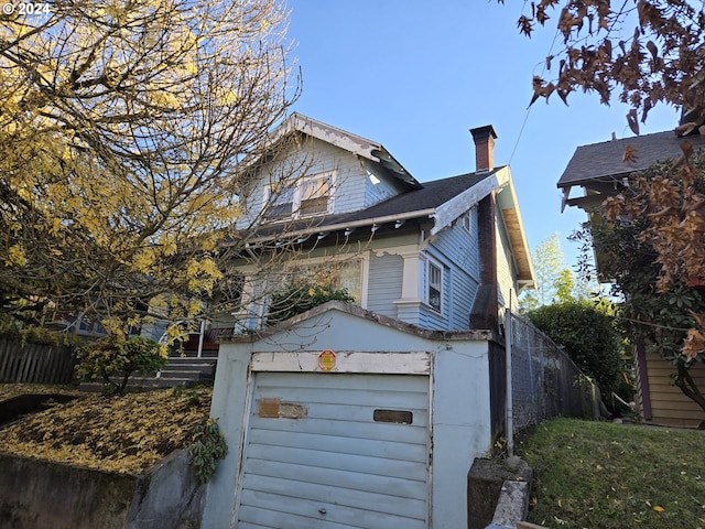 view of home's exterior with a garage