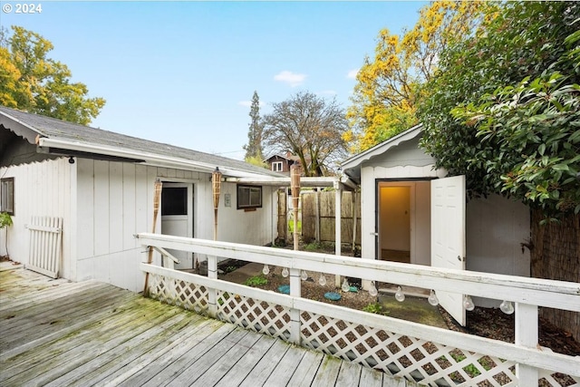 deck with an outdoor structure