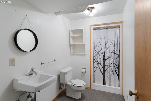 bathroom featuring sink and toilet