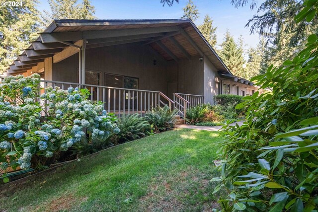 view of home's exterior with a lawn