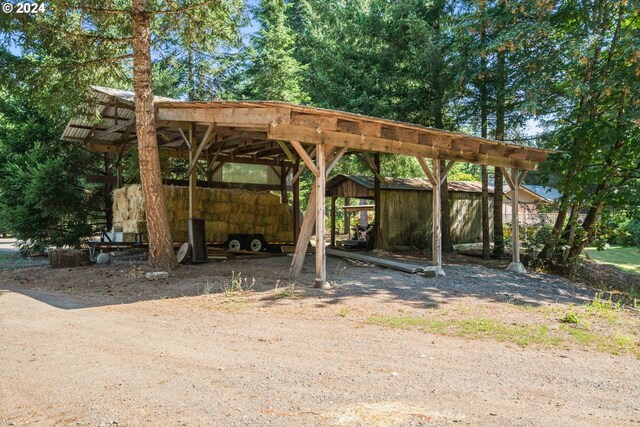 exterior space featuring a carport