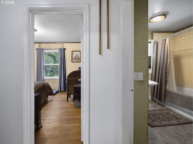 bathroom featuring hardwood / wood-style flooring