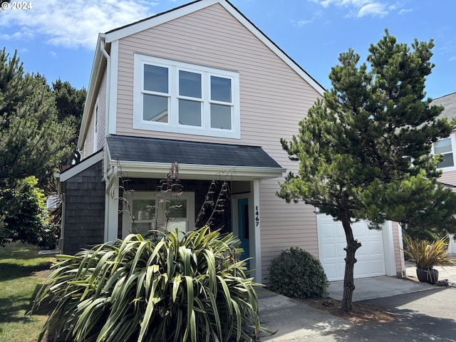 view of front of property featuring a garage