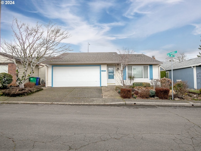 single story home with a garage