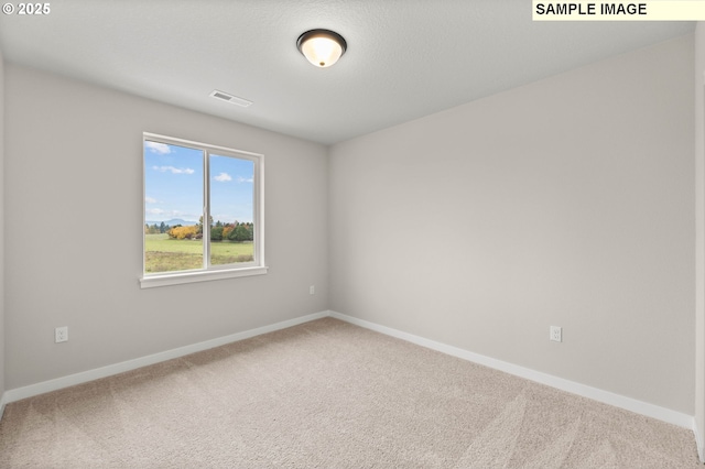 1376 NE Josephine Ct Unit 184, Estacada, OR 97023 - carpeted spare room featuring visible vents and baseboards
