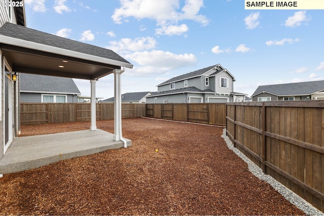 1376 NE Josephine Ct Unit 184, Estacada, OR 97023 - view of yard with a fenced backyard and a patio area