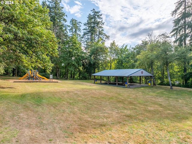 view of yard featuring a gazebo and a playground