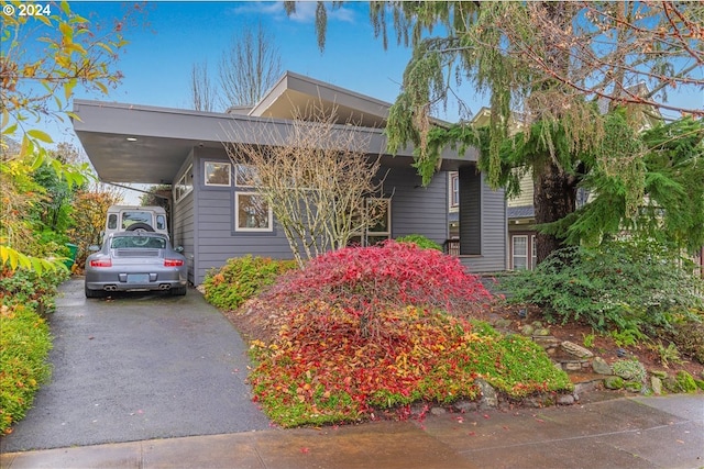 view of front of house with a carport