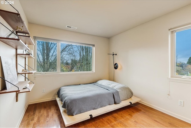 office area featuring light wood-type flooring, baseboards, and recessed lighting